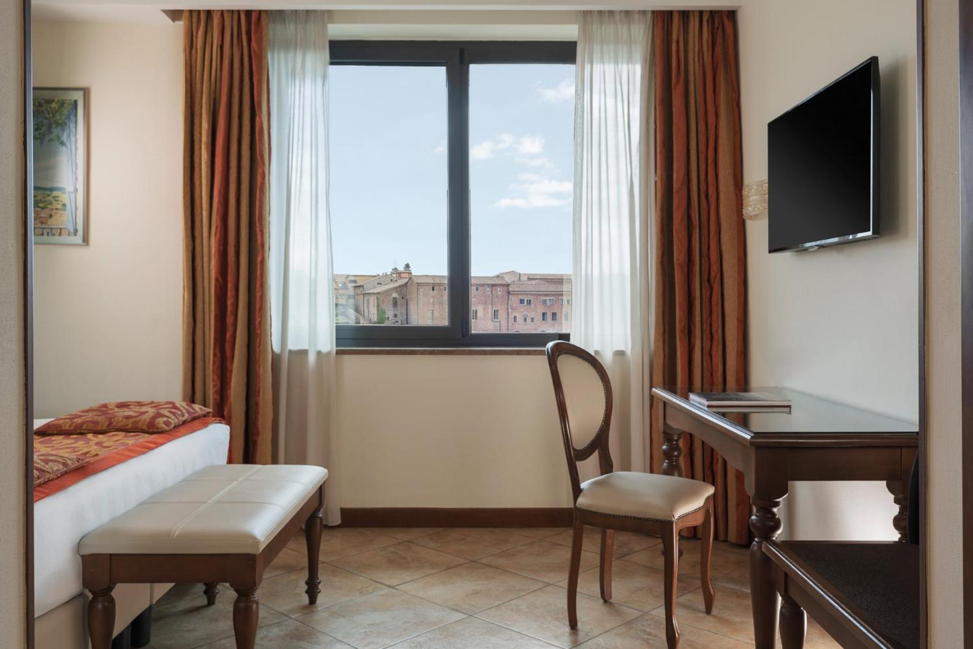 Quarto Deluxe com Cama de Casal ou 2 de Solteiro